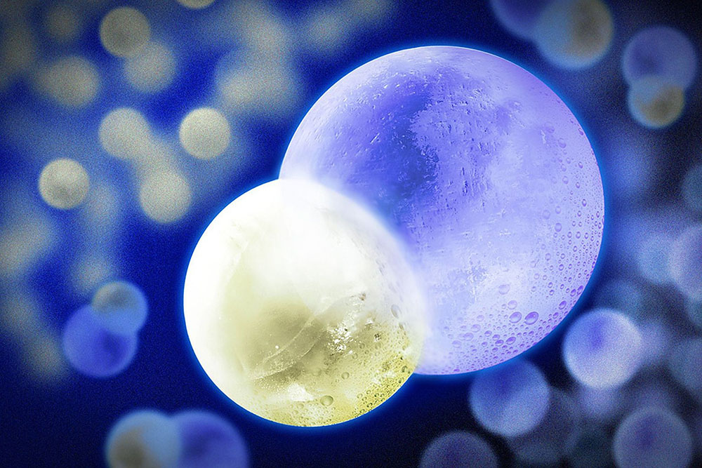 Pesquisadores do MIT refrigeraram um gás de potássio de sódio à 500 nanokelvin. (A esfera menor é o átomo de sódio e a esfera maior é o átomo de potássio).